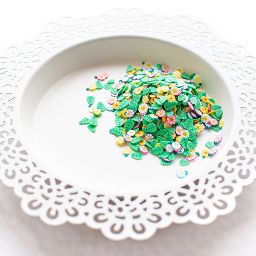 Confettis d’argile de jardin de fleurs