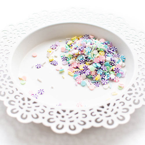 Confettis d’argile tourbillonnants pastel