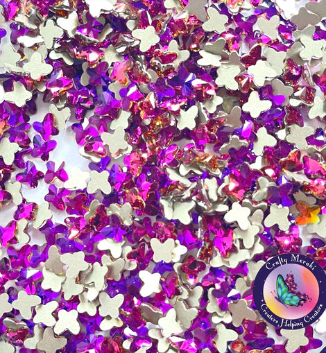 Papillon rose scintillant Meraki