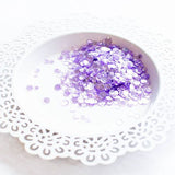 Confettis violets chatoyants